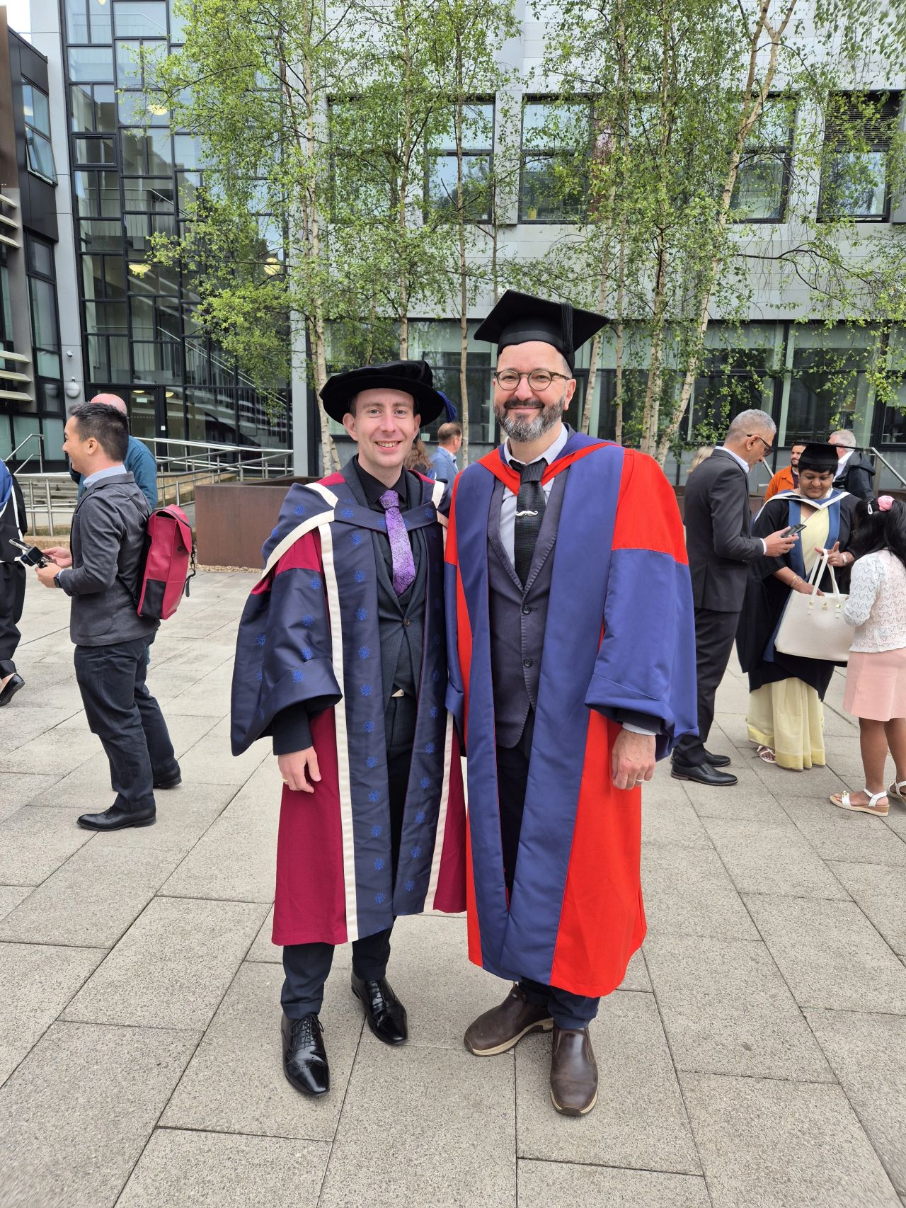 Dr Adam Tate at his PhD graduation ceremony, celebrating academic excellence